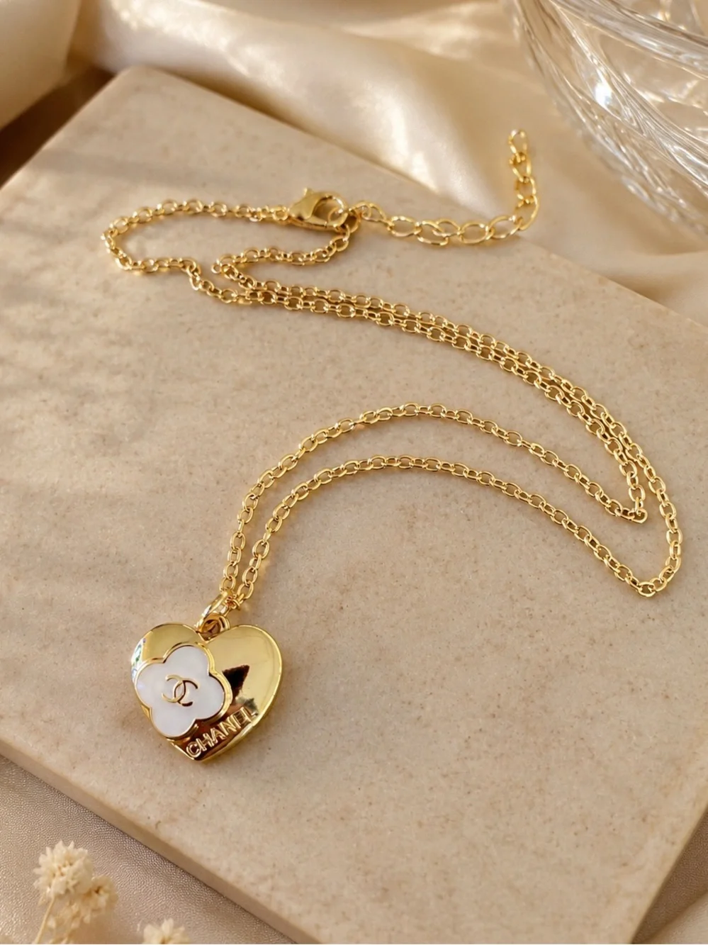 Gold Heart Pendant Necklace with White Floral Detail